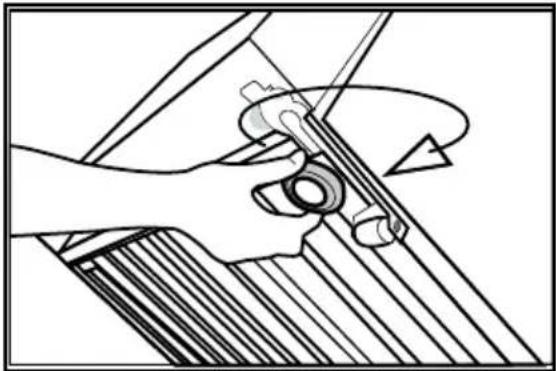 Mechanical assembly diagram showing a hand operating a tool with a curved handle.