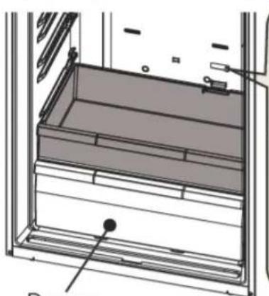 Technical line drawing of a refrigerator interior showing drawer, shelves, and door (no text or symbols)