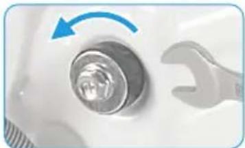 Close-up of a mechanical component with a wrench and circular knob, no visible text or symbols