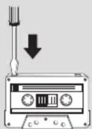 Diagram of a cassette tape with a screwdriver inserted, showing a downward arrow indicating compression or disassembly (no text or symbols present)