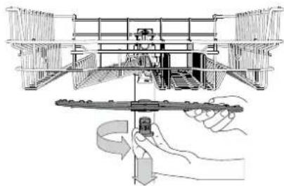 Technical line drawing of a mechanical assembly with a hand holding a tool, no visible text or symbols