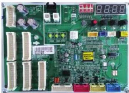 Green printed circuit board with various electronic components and connectors (no readable text or symbols)