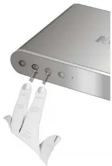 Close-up of a hand inserting a USB into a device (no visible text or symbols)