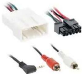 Electrical connector components including a white plastic housing, black and red connectors, and two white cables (no text or symbols visible)