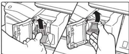Illustration of a hand inserting a component into a device (no text or symbols visible).