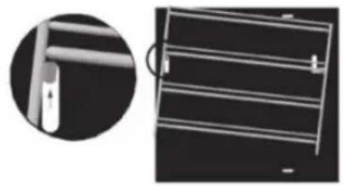 Close-up of a metal frame structure with a magnified inset showing a small component (no text or symbols visible)