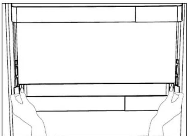 Line drawing of two hands holding a rectangular object, no text or symbols present