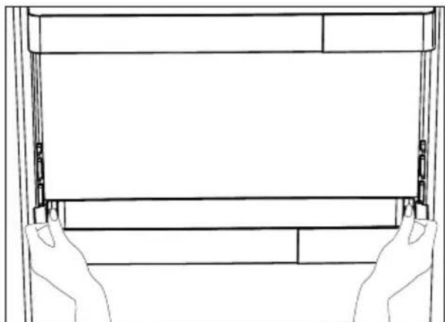 Line drawing of two hands holding a rectangular object, no text or symbols present