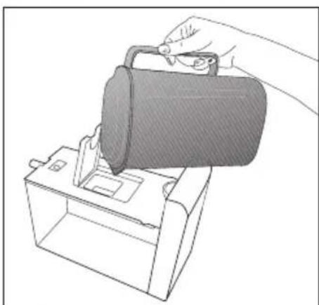 Line drawing of a hand using a device to lift a cylindrical object into a box (no text or symbols)