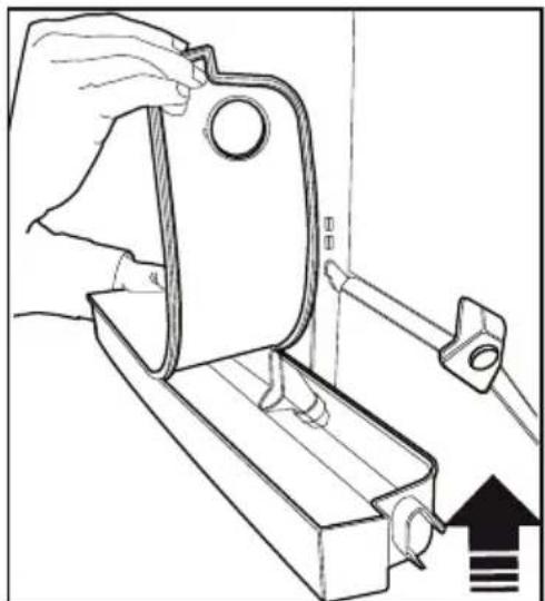 Line drawing of a hand using a tool to adjust or install a mechanical component, with no visible text or symbols.