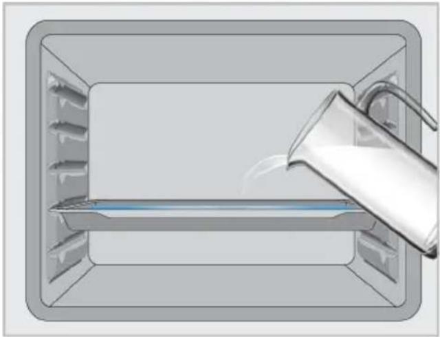 Illustration of a container with a glass pitcher pouring liquid into it (no text or symbols).