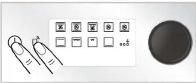 Diagram showing finger typing on a control panel with icons and a circular button, likely illustrating a manual keyboard or control interface.
