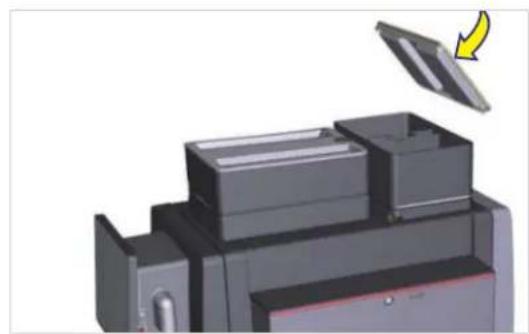 3D rendering of a mechanical device with a yellow arrow indicating rotation (no text or symbols visible)