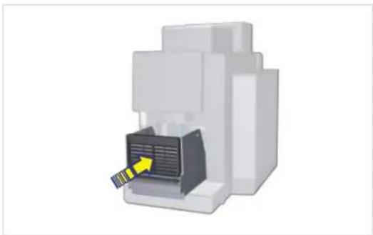 3D rendering of a printer with a yellow arrow pointing to its internal structure (no text or symbols visible)