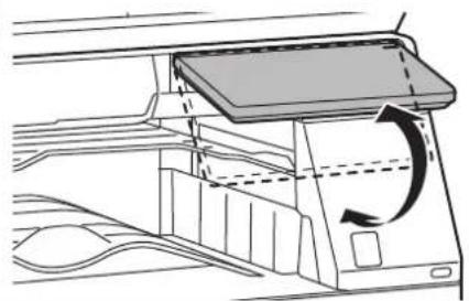Diagram of a device interior showing airflow or movement with arrows indicating direction (no text or symbols)