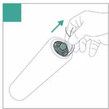 Hand holding a test tube with a spiral inside, showing a green arrow indicating direction (no text or symbols)