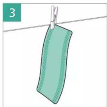 Illustration of a green fabric hanging from a clothesline against a white background (no text or symbols)