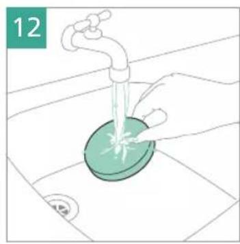 Illustration of a hand washing a green circular object with a faucet, placed on a surface (no text or symbols)