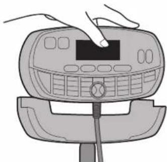 Illustration of a hand using a digital device to press or install a control panel (no text or symbols visible)