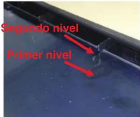 Hand pointing at a transparent display panel with a red arrow indicating direction (no text or symbols visible).