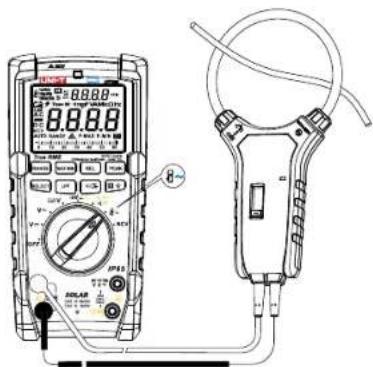 Technical diagram of a digital multimeter connected to an analog electrical tester with labeled components and wiring.