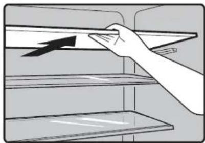 Illustration of a hand placing a tray with an arrow on the shelf (no text or symbols)