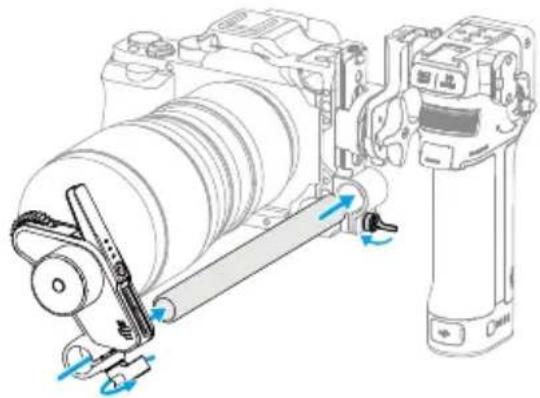 Mechanical assembly diagram showing a cylindrical device connected to a robotic arm with blue directional arrows indicating motion (no text or symbols present).