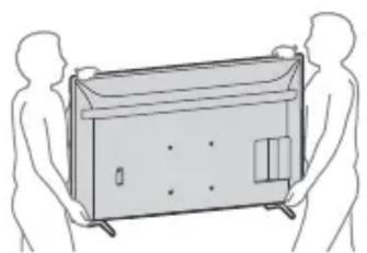 Line drawing of two silhouetted figures holding a rectangular device (no text or symbols)