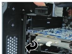 Close-up of a computer motherboard showing CPU socket and drive mechanism (no text or symbols visible)