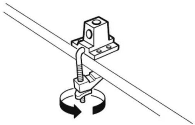 Technical line drawing of a mechanical clamp or bracket assembly mounted on a diagonal line, with no visible text or symbols.