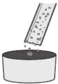 Illustration of a test tube dispensing granular material into a cylindrical container (no text or symbols)