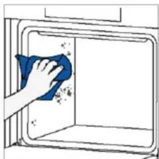 Hand cleaning a window with a cloth, showing surface dust and debris (no text or symbols)