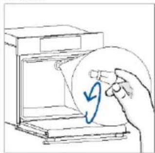 Hand holding a circular object with a blue checkmark inside, next to an open device (no text or symbols visible)