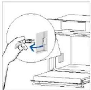 Illustration of a hand holding a small object near a shelf.