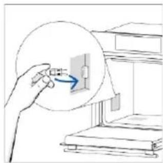 Illustration of a hand inserting a component into a device (no text or symbols visible).
