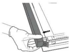 Hand holding a metal bracket with a small inset view (no text or symbols visible).