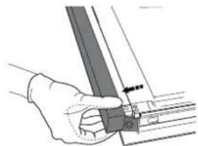 Hand holding a metal bracket with a small inset view showing a pin (no text or symbols visible)