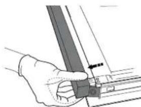 Hand holding a metal bracket with a small inset detail (no text or symbols visible)
