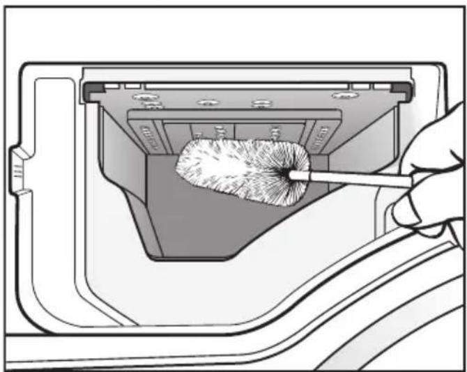 Illustration of a hand using a tool to remove or brush into a container with a brush (no text or symbols).
