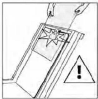 Diagram showing a hand holding a star-shaped object with an exclamation mark and warning triangle, likely illustrating a warning or hazard.