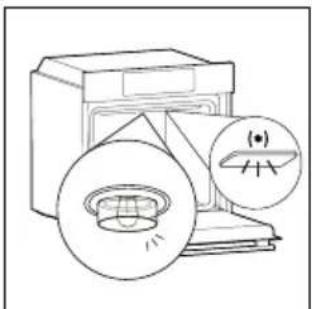 Diagram of a washing machine with two circular components, one showing internal structure and the other with a pointer (no text or symbols).