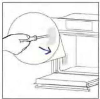 Illustration of a hand holding a tool near a circular object, with an arrow indicating direction (no text or symbols)
