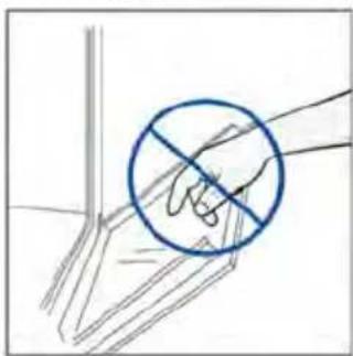 Hand holding a blue circle with a diagonal line crossing through it, no text or symbols present