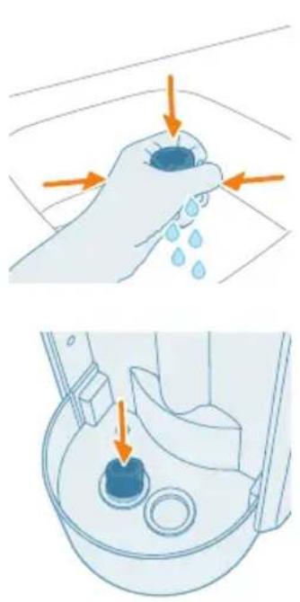 Illustration showing a hand washing a sink with water droplets, and a close-up of the sink's mouth with a small object (no text or symbols)