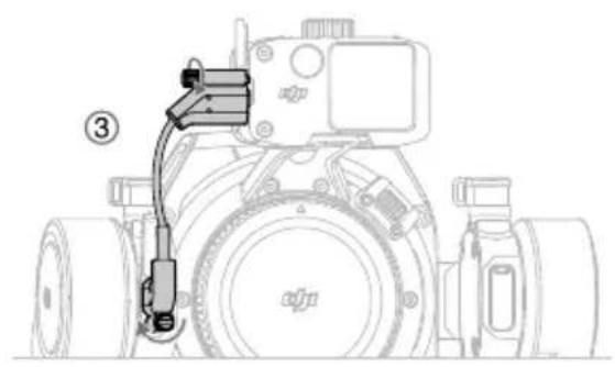 Technical line drawing of a DSLR camera with attached sensor and connector (no text or symbols).