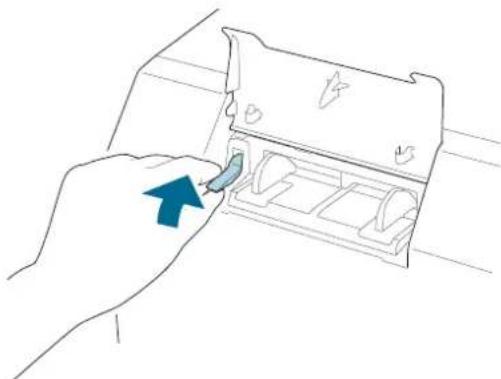 Line drawing of a hand inserting a small component into a device housing (no text or symbols)