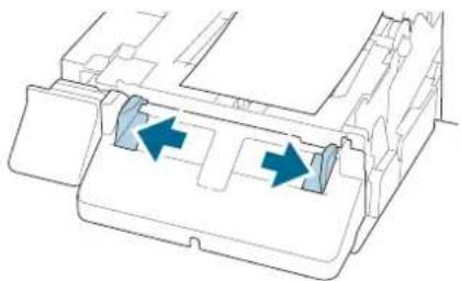 Diagram of a printer or printer component with two blue arrows indicating flow or movement (no text or symbols present)