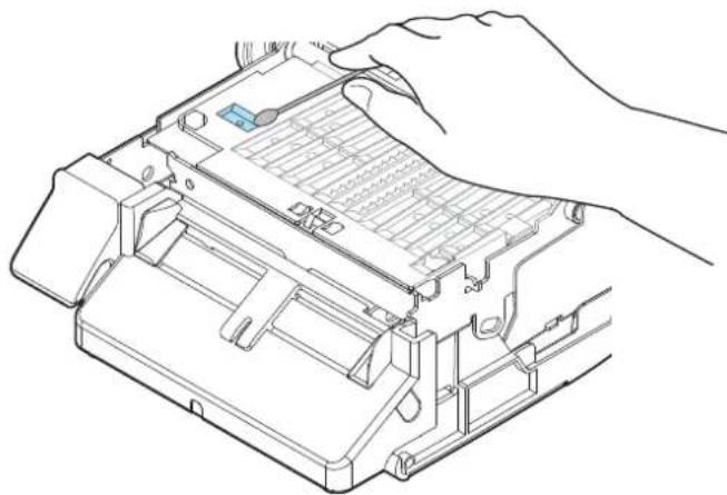 Line drawing of a hand inserting a component into a device casing (no text or symbols).