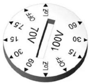 Close-up of a rotary dial with voltage and time markings, showing 70V, 100V, 15V, 20V, 25V, 30V, 35V, 40V, 45V, 50V, 55V, 60V, 65V, 70V, 75V, 80V, 85V, 90V, 95V, 100V, 105V, 110V, 115V, 120V, 125V, 130V, 135V, 140V, 145V, 150V, 155V, 160V, 165V, 170V, 175V, 180V, 185V, 190V, 195V, 200V, 205V, 210V, 215V, 220V, 225V, 230V, 235V, 240V, 245V, 250V, 255V, 260V, 265V, 270V, 275V, 280V, 285V, 290V, 295V, 300V, 305V, 310V, 315V, 320V, 325V, 330V, 335V, 340V, 345V, 350V, 355V, 360V, 365V, 370V, 375V, 380V, 385V, 390V, 395V, 400V, 405V, 410V, 415V, 420V, 425V, 430V, 435V, 440V, 445V, 450V, 455V, 460V, 465V, 470V, 475V, 480V, 485V, 490V, 495V, 500V