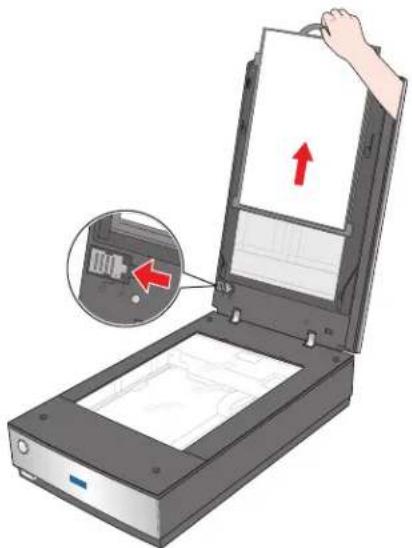 Illustration of a handheld scanner with an open lid and a hand holding the paper, showing a close-up of the internal components (no text or symbols present).